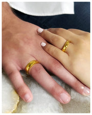 Model wearing 24K rings showing two different widths