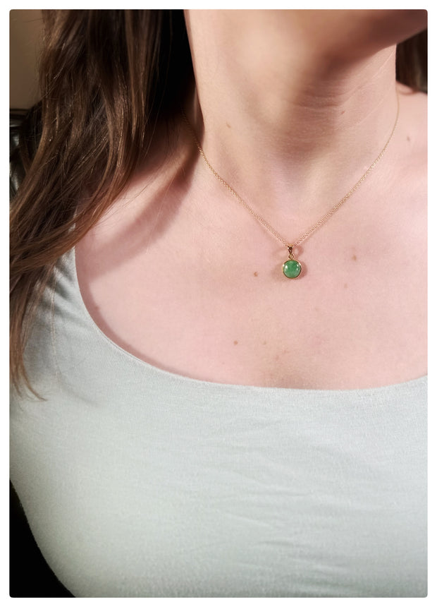 Model wearing the mini Jade circle drop pendant