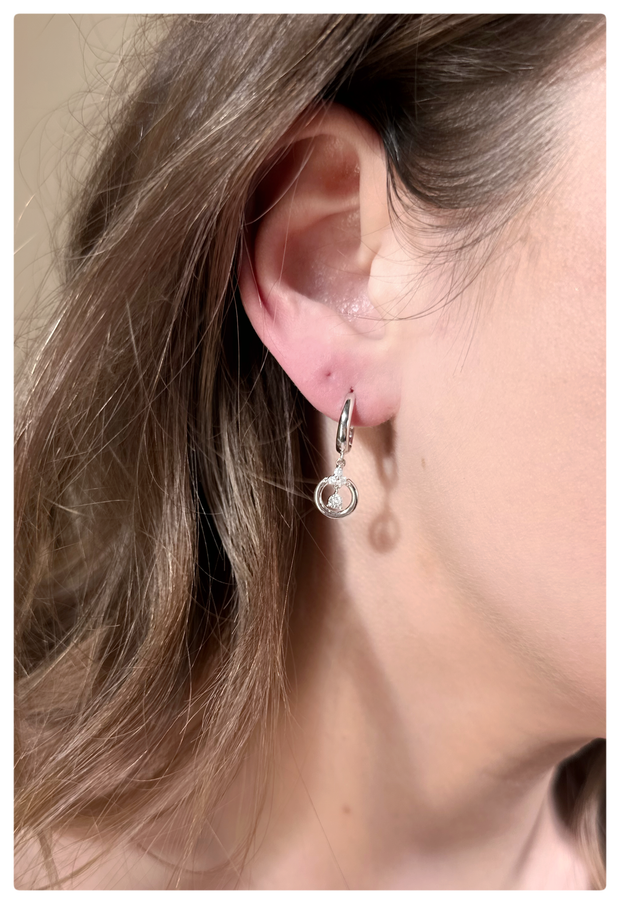 Model wearing Olivia Hoops on ear