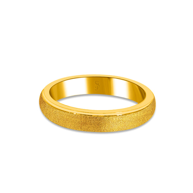 24K gold band on a white background