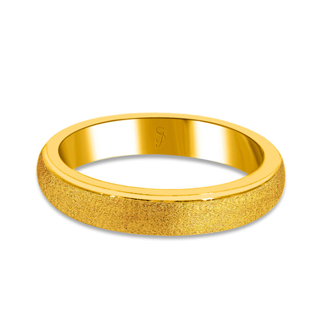 24K solid gold band on a white background