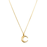 Gold necklace with a diamond crescent moon pendant on a white background.