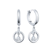 Pair of hoop earrings with dangling diamonds on a white background.